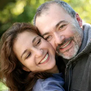 Middle-aged couple smiling